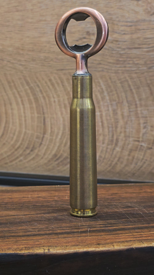 Metalni otvarač za boce u obliku 12.7x99mm metka